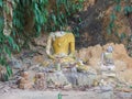 Destroyed head Ancient buddha statue