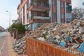 Destroyed homes ruins pile of concrete and bricks in after the earthquake. Demolished buildings, clearing rubble