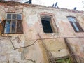 Destroyed house after a fire. Old brick building with Windows Royalty Free Stock Photo