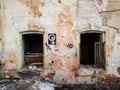 Destroyed house after a fire. Old brick building with Windows Royalty Free Stock Photo