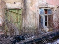 Destroyed house after a fire. Old brick building with Windows Royalty Free Stock Photo