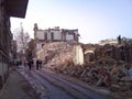 The destroyed houses, the street in ruins
