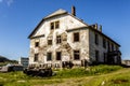 Destroyed old abandoned stone house in village Teriberka in Kolsky District of Murmansk Oblast, Russia