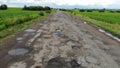 Destroyed road that needs repairs, countryside, Ukraine Royalty Free Stock Photo