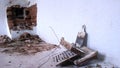 Destroyed stove in an old house and its fragments