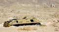 A destroyed tank in a field near Ghazni in Afghanistan