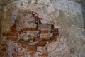 Destroyed wall in an ancient red brick building Royalty Free Stock Photo