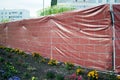 The destroyed wall is closed by a printed image.