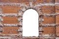 Destroyed wall of old bricks with a hole in the middle. isolated on white background. grunge frame. horizontal frame Royalty Free Stock Photo