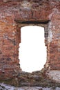 destroyed wall of old bricks with a hole in the middle. isolated on white background. grunge frame. vertical frame Royalty Free Stock Photo