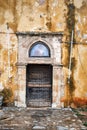 destroyed wooden door to an Orthodox chapel on the Greek island of Crete Royalty Free Stock Photo