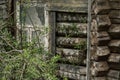 Destroyed wooden old houses in an abandoned village evicted during the Chernobyl accident at a nuclear power plant.