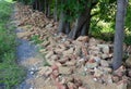 Destruction of the garden fence. badly fired bricks succumbed to erosion. water and snow flowed inside the wall and the frost tore