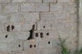 Destruction of the wall in various manifestations and causes, in the form of cracks, holes, chips