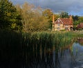 English country house with pond