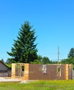 Detached family home under construction with fir tree on back yard Royalty Free Stock Photo