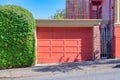 Detached garage exterior with peach wooden garage door at San Francisco, California Royalty Free Stock Photo