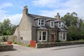 Detached house in the village Braemar in Scotland. Royalty Free Stock Photo