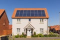 Detached new build home with solar panels on the roof. UK Royalty Free Stock Photo