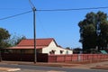 Detached residential house with corrugated sheet iron roof and fence in Western Australia Royalty Free Stock Photo