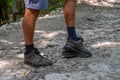 detached sole on the tourist's sneakers. They broke their boots in the woods Royalty Free Stock Photo