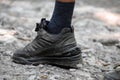 detached sole on the tourist's sneakers. They broke their boots in the woods Royalty Free Stock Photo