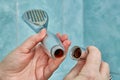 Detaching shower head from hose for cleaning or replacement. Royalty Free Stock Photo