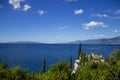 Detail of the Adriatic Sea with mountains, trees and holiday home.