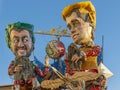 Detail of the allegorical chariot dedicated to political satire with Di Maio and Salvini parading at the Carnival of Viareggio