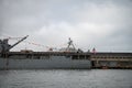 Detail of an American military warship with a helicopter.