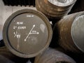 Detail from American oak casks with manzanilla wine. Sanlucar de barrameda, Spain. Royalty Free Stock Photo