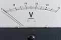 Detail of an analog voltmeter, pointer scale