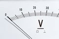 Detail of an analog voltmeter, pointer scale