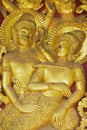 Detail of the ancient golden exterior wall decoration at Wat Xieng Thong Buddhist temple in Luang Prabang, Laos. Royalty Free Stock Photo