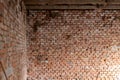 Detail of an ancient red brick wall slightly bleached with salt. The bricks were blocked by metal tie rods. Background use Royalty Free Stock Photo