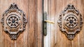 Detail of an ancient wooden door carved. Royalty Free Stock Photo