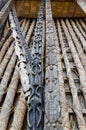 Detail of animal wood carvings on pillars at traditional Fon`s palace in Bafut, Cameroon, Africa