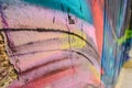 Detail of an anonymous street graffiti with many colors, cheerful urban background Royalty Free Stock Photo