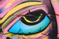 Detail of an anonymous street graffiti with many colors, cheerful urban background Royalty Free Stock Photo