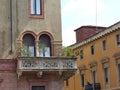 Corner of an ancient balcony with plants to Milan in Italy.