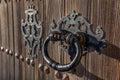Detail of an antique door handle made of iron Royalty Free Stock Photo