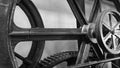 Detail of antique elevator metal gear wheel black and white Royalty Free Stock Photo