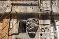 Detail antique plaster on a house in Italy