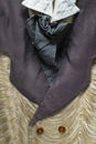 Detail of a Antique, Western Style Men's Suit with a Fancy Vest and Tie