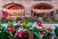 Detail of the arcade in an old, traditional, silesian brick block house in Nikiszowiec, Katowice, Poland. Colorful ribbons hanging Royalty Free Stock Photo