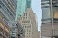 Detail of art deco and modern skyscrapers and street lantern