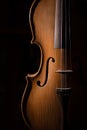 Detail of artisan violin on a black background