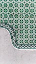Detail azulejos tiles green with stone wall