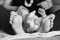 Detail of baby feet in black and white