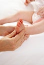 Detail baby having foot massage Royalty Free Stock Photo